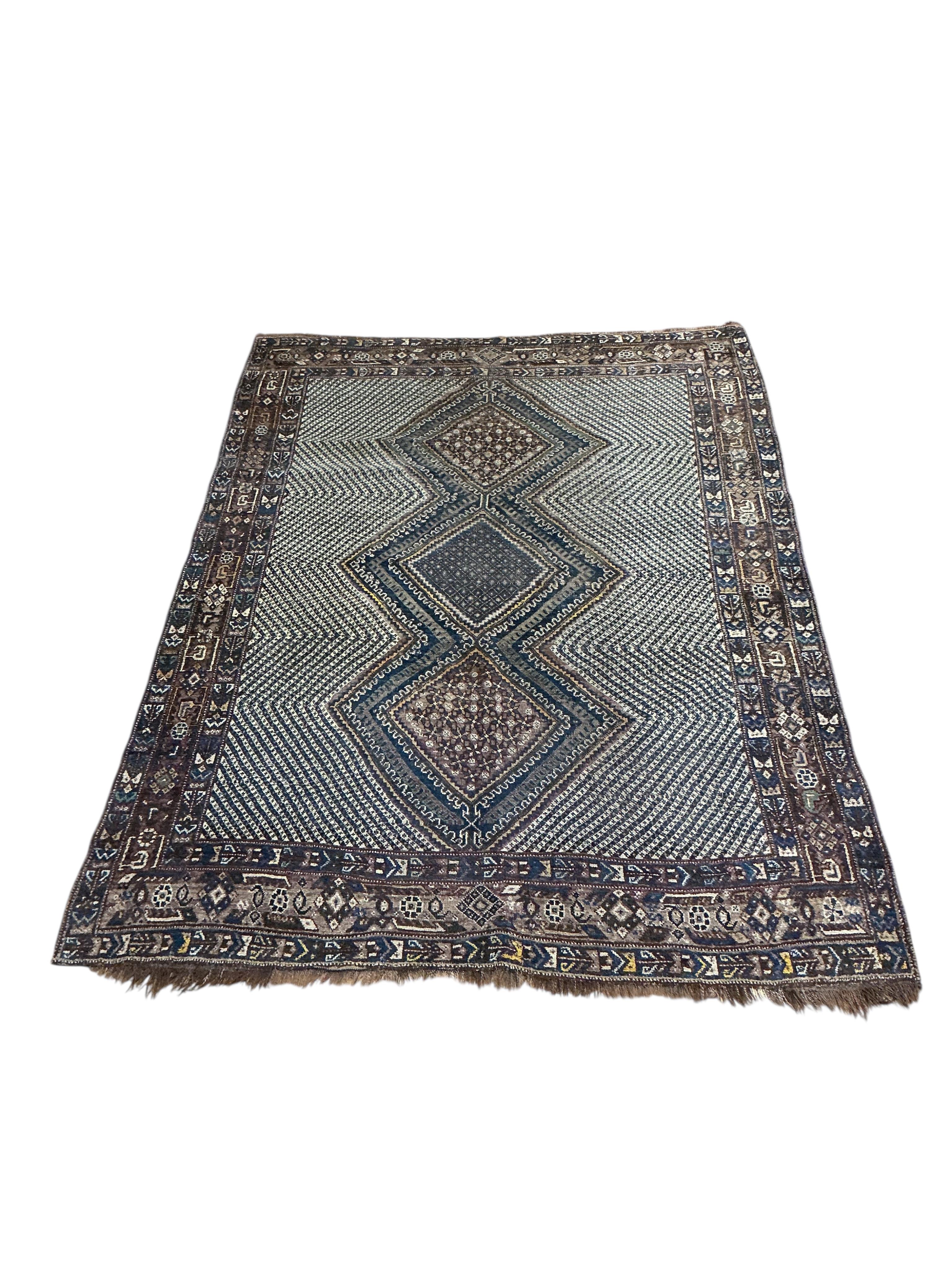 An Afshar blue ground rug, 176 x 130cm